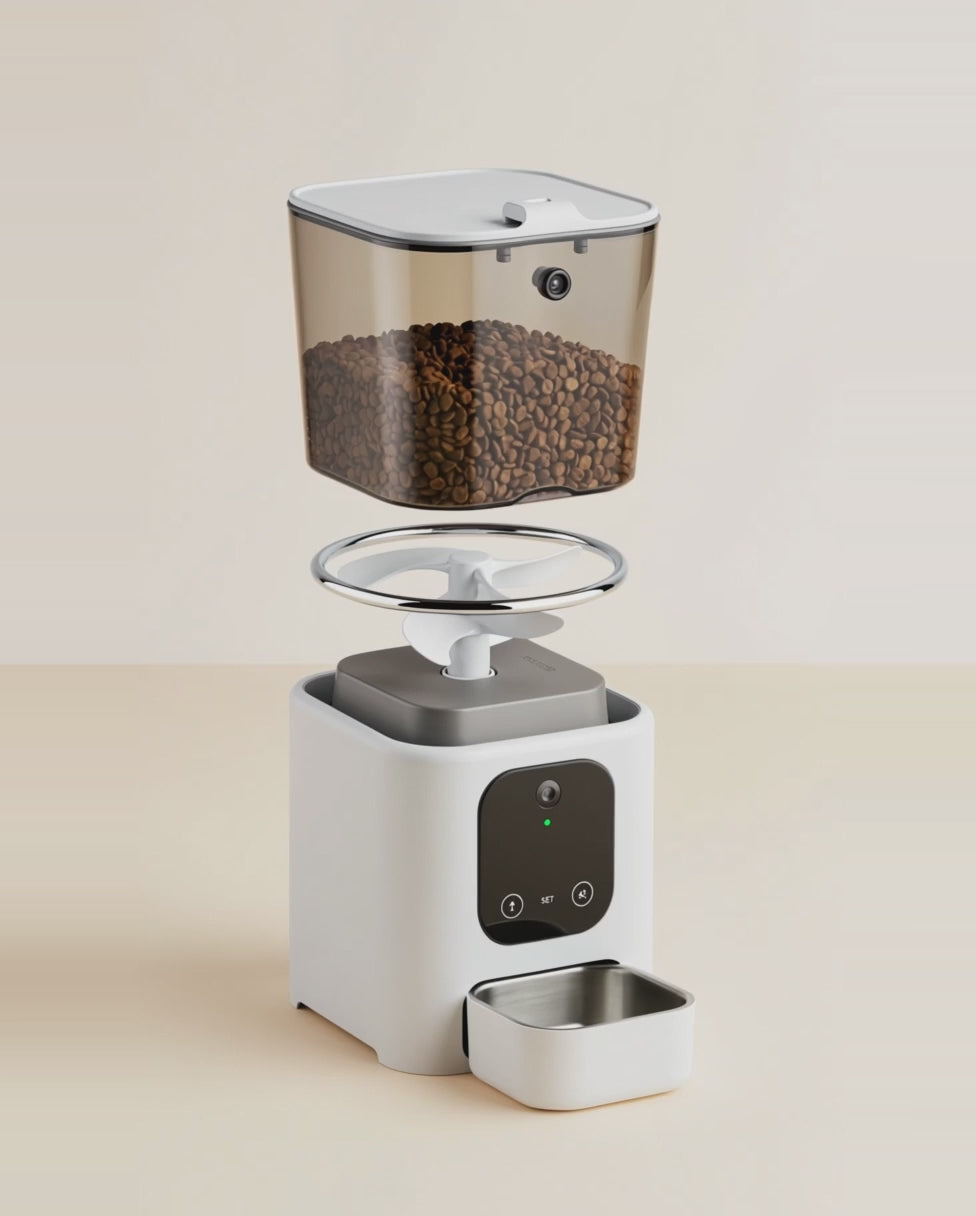 Vue éclatée du distributeur automatique FoyerPet : les pièces se rassemblent
